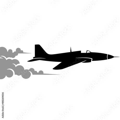Silhouette of a fighter jet flying with smoke trail