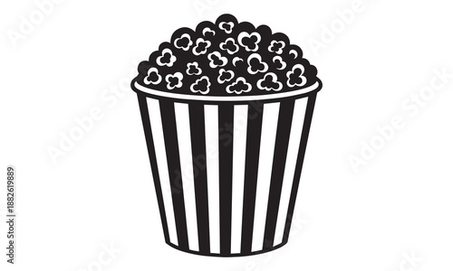 Classic black and white striped bucket overflowing with popcorn, perfect for movie night or snack time.
