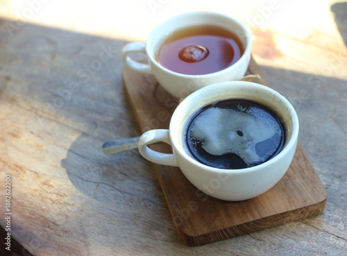 Hot coffee on a wooden table.