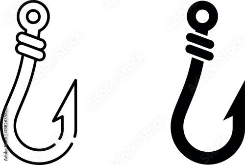 Two black and white fishing hooks with barbs and loops on plain background fish hook