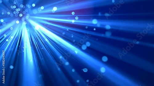 Vibrant blue light rays radiate outward in a mesmerizing abstract background with bokeh effect.
