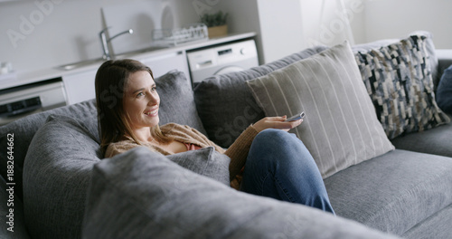Photography Relax, remote or woman watching tv on couch, check video choice or streaming movie for cozy weekend