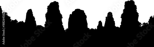 Panoramic karst mountain landscape silhouette, featuring rugged rock formations and peaks.