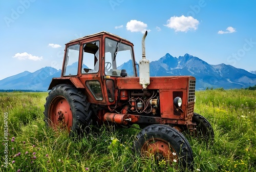 Old Red Vintage Tractor Abandoned in a High Grass Meadow