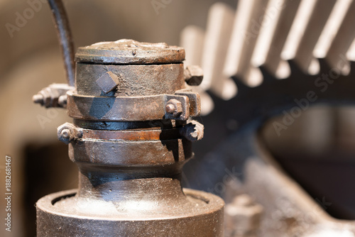 Old industrial machinery showing rusting metal gear components