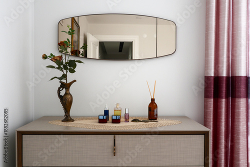 Personal care products decoration on a mirrored console
