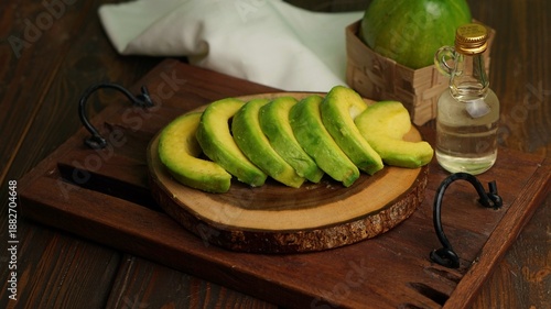 Quadro su tela avocado and virgin coconut oil on white background, selective focus