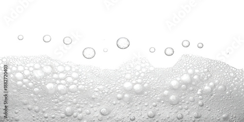 Close-up of refreshing bubbles and foam on a white background