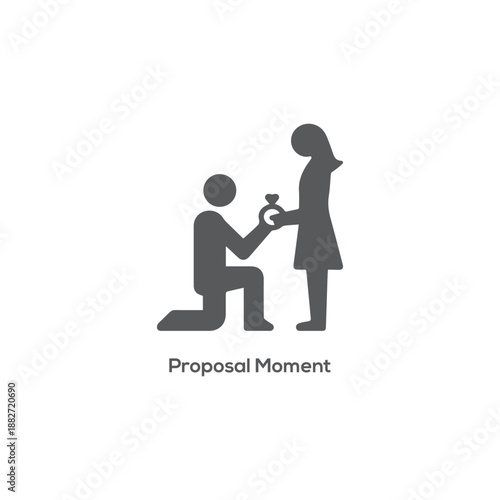 Romantic marriage proposal moment logo silhouette featuring a man on one knee giving an engagement ring to a woman
