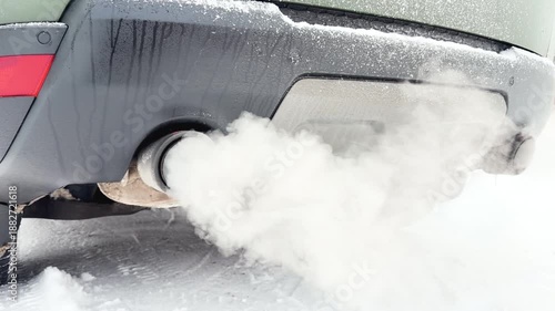Pollution of environment from powerful car. Air pollution from vehicle exhaust pipe. Smoke coming out of the car exhaust pipe. Smoke emissions