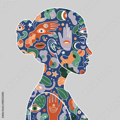 Silhouette of a woman's head filled with colorful abstract symbols and eyes.