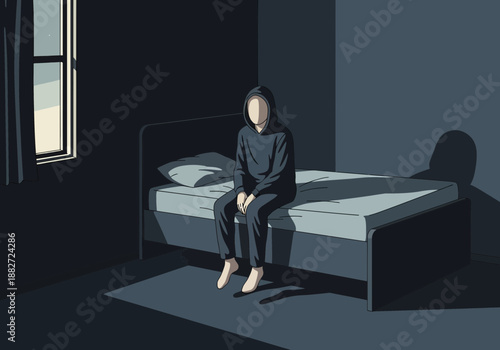 Person sitting on a bed in a dimly lit room.