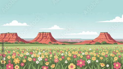 A vibrant desert meadow blooms with colorful flowers before red rock formations