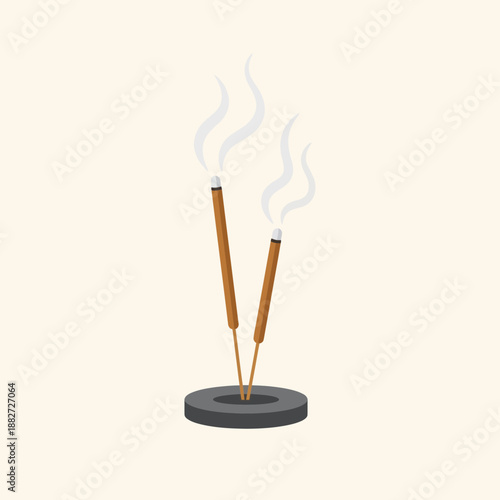 Two incense sticks burning in a dark holder with smoke rising.