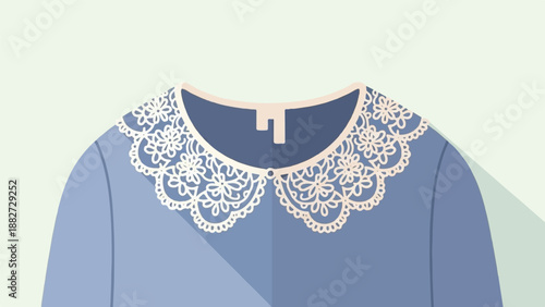 A close-up view of a blue dress with a white lace collar and a beige tag