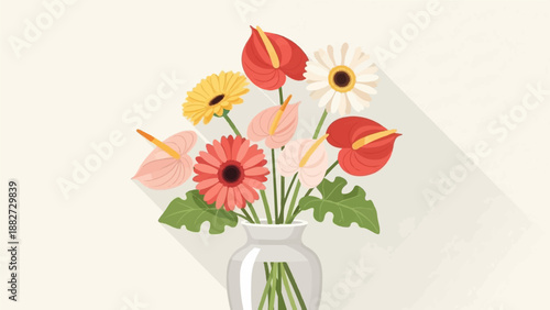 A clear glass vase holds a vibrant bouquet of assorted flowers and green leaves