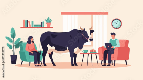 A cow stands in a living room with two people, one working on a laptop
