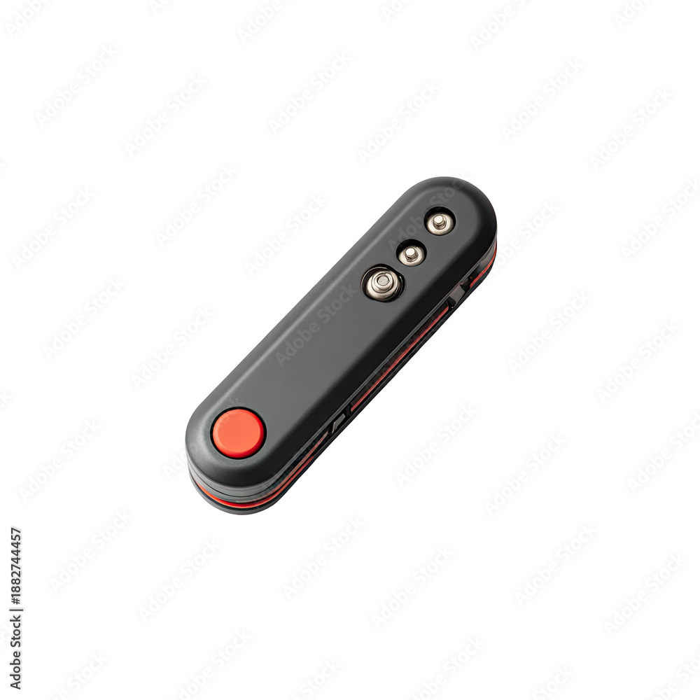 Fototapeta premium Angled view of small black/gray gadget with red accent and buttons
