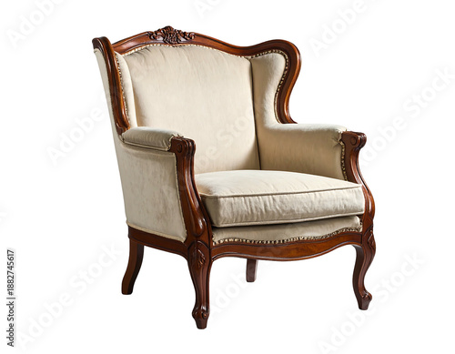 Ornate wooden armchair with upholstered cream seat and back