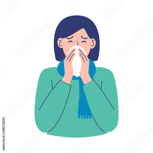 Woman with cold sneezing into a tissue