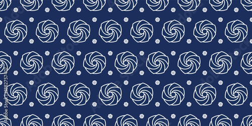 Japanese indigo batik pattern with white geometric floral motifs on navy blue background. Traditional shibori textile style for oriental fabric design and wallpaper.