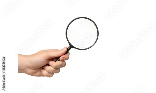 A hand holding a magnifying glass on a white background