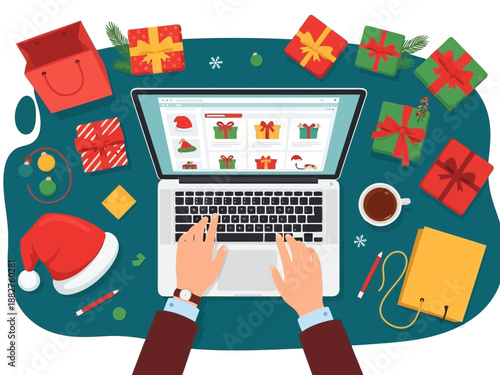 Hands typing on laptop with christmas presents and decorations