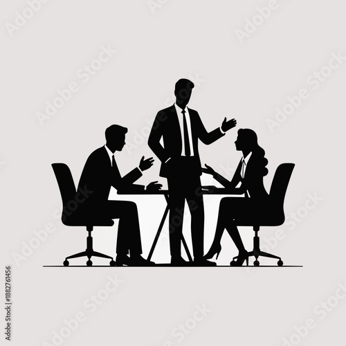 Silhouette Business Meeting: A dynamic business meeting unfolds as professionals engage in a lively discussion around a table. A symphony of ideas, collaboration, and strategies.