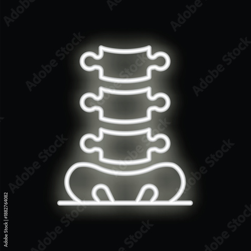 White neon spinal cord glowing on black background representing chiropractic and osteopathy