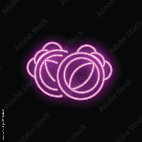 Bright pink neon sign of a tambourine glowing on a black background