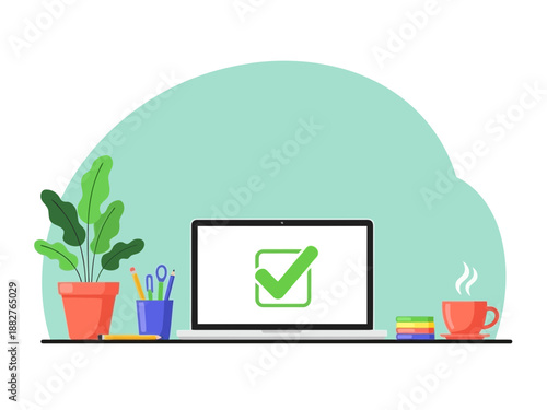 Laptop with green checkmark on screen surrounded by office supplies
