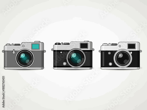 Three old film cameras lined up side by side