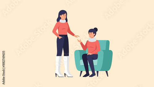 A woman stands while another sits in a chair, engaged in conversation