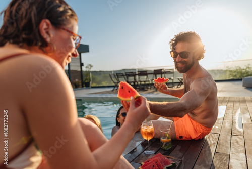 Sticker Friends eating watermelon and drinking cocktails by the pool during summer vacat