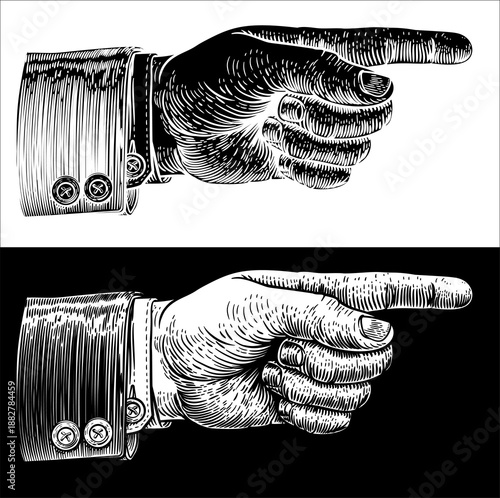 A hand pointing a finger in...