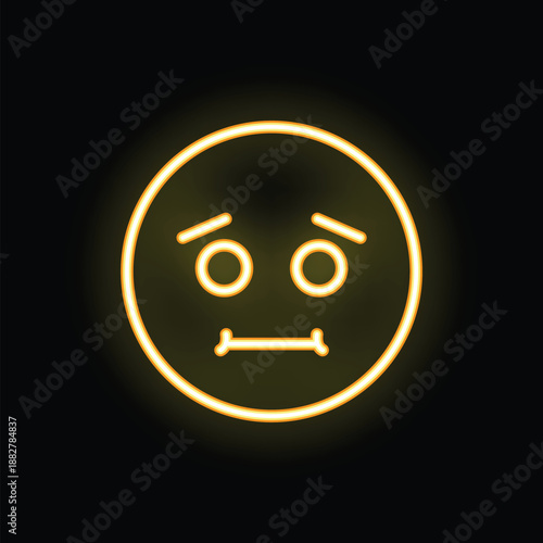 Neon yellow sad face is glowing on a black background
