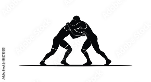 two wrestlers locked in a dynamic grappling pose showcasing strength and competition captured in a striking black and white silhouette