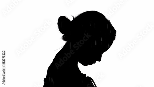 Double exposure of woman silhouette with falling rain – sadness and introspection concept