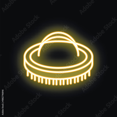Yellow neon icon of a round brush glowing on a dark background