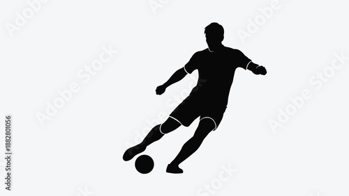Dynamic black silhouette of a male soccer player in action, skillfully kicking a football with precision and power during an intense game or practice.
