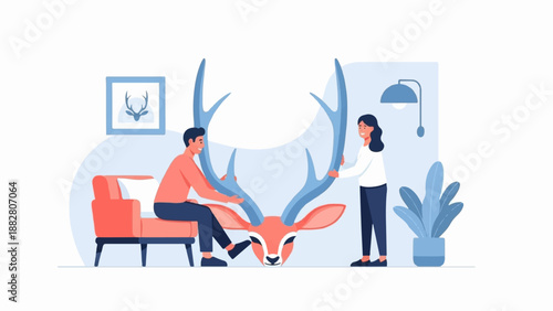Couple interact with large deer antlers in a modern interior