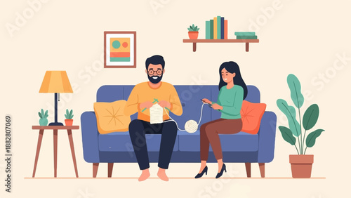 Couple knitting together on a couch with home decor