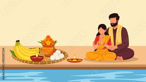 Couple performs ritual with offerings of fruits, flowers, and lamps near water