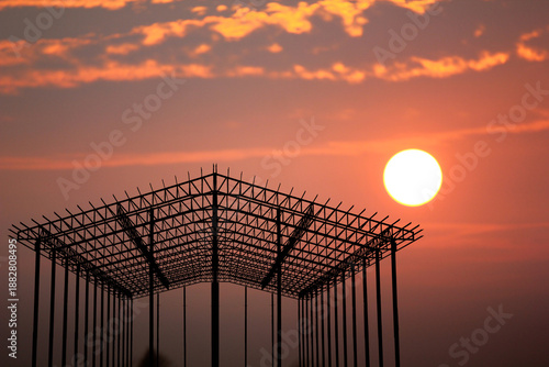 warehouse steel structure on sun set abstract nature background. gruop of object on sun dawn background