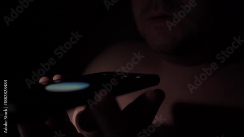 Man Talking to AI Voice Assistant at Home