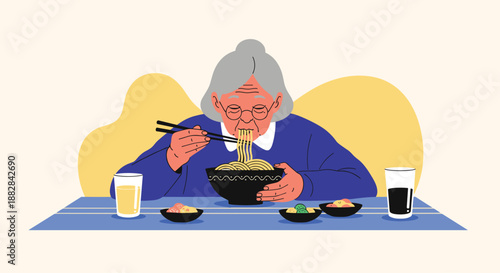 Elderly woman with grey hair and glasses focused on eating a steaming bowl of noodles with chopsticks at a kitchen table.