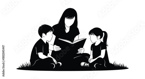 a black and white image depicts a woman reading a book to two young children seated on the grass showing a heartwarming scene silhouette