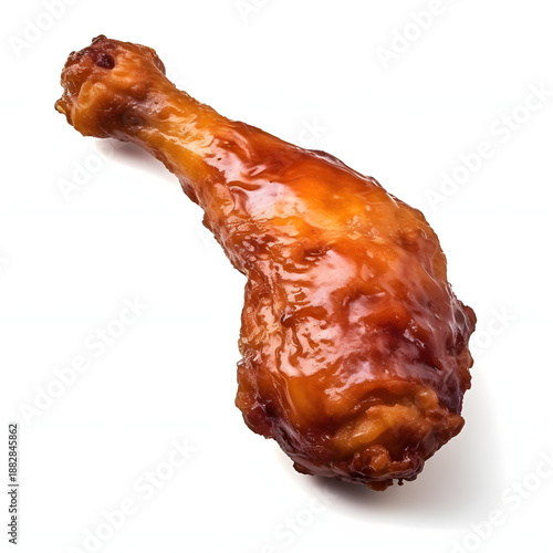 A delicious roasted chicken leg is a tasty cooked meat snack isolated on white, featuring grilled brown skin and a juicy smoked barbecue texture perfect for a fried chicken meal dinner