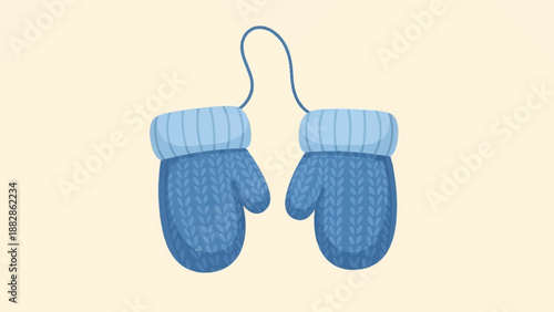 Pair of blue knitted mittens connected by a string