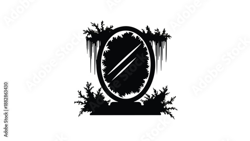 Mysterious antique mirror framed by dark, spooky foliage and moss